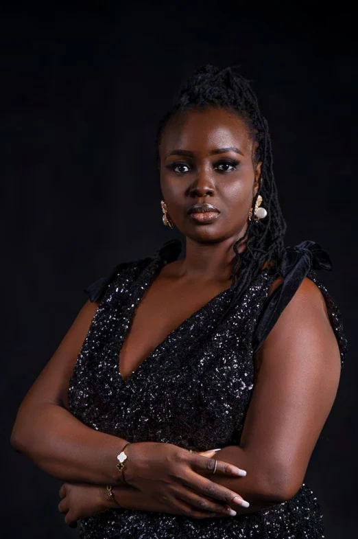Studio portrait in a black dress