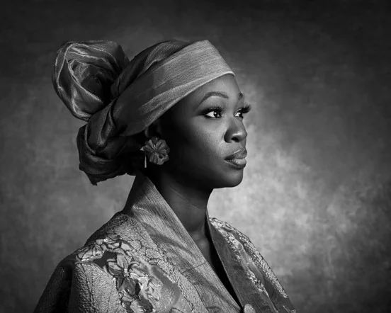 Black and white portrait with a headwrap